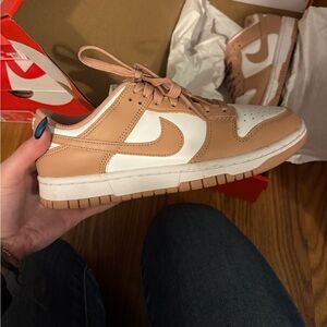 Women’s Rose whisper dunks.